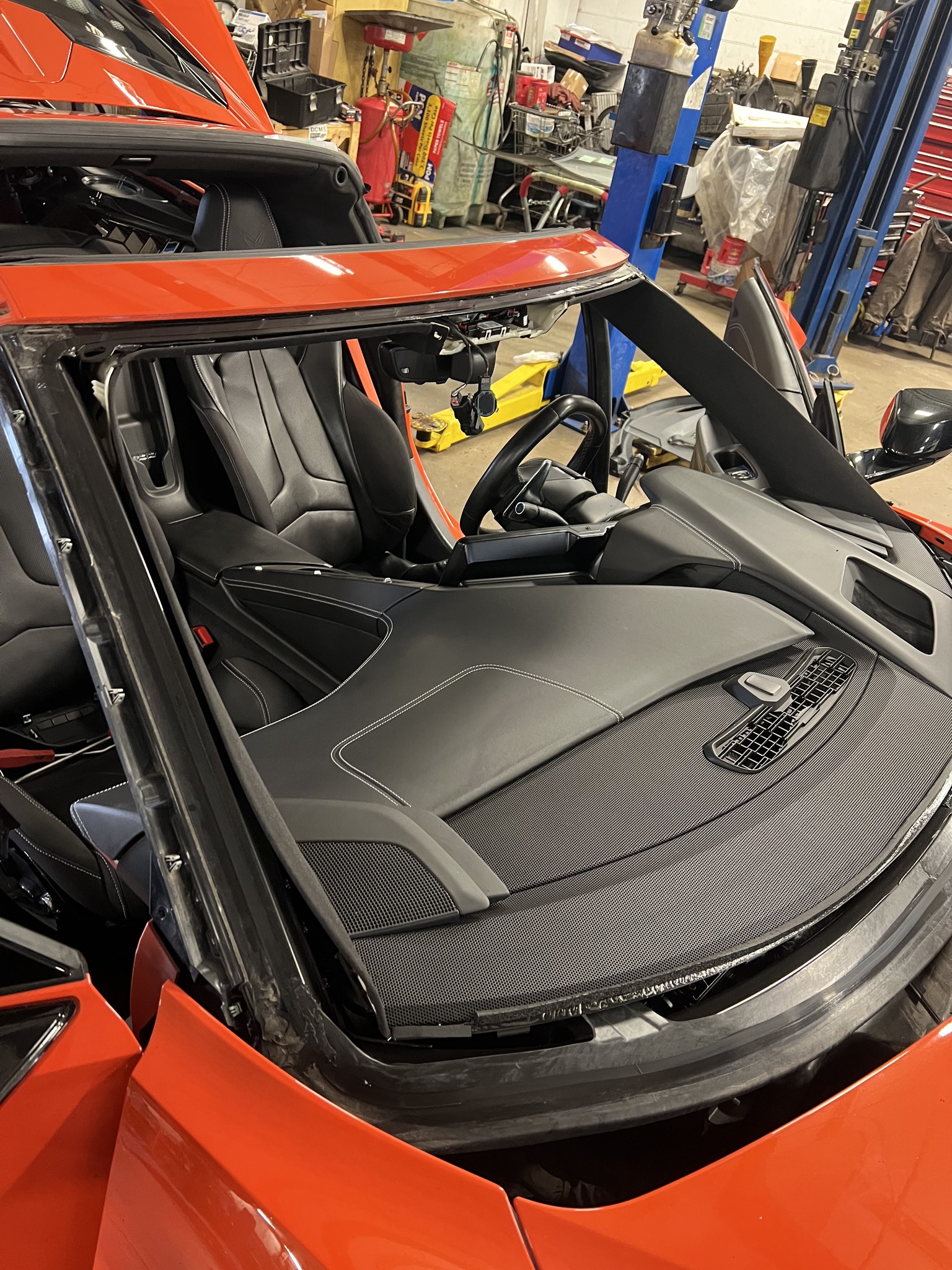 Corvette glass removal and replacement in progress at the B-Rite Autoglass shop